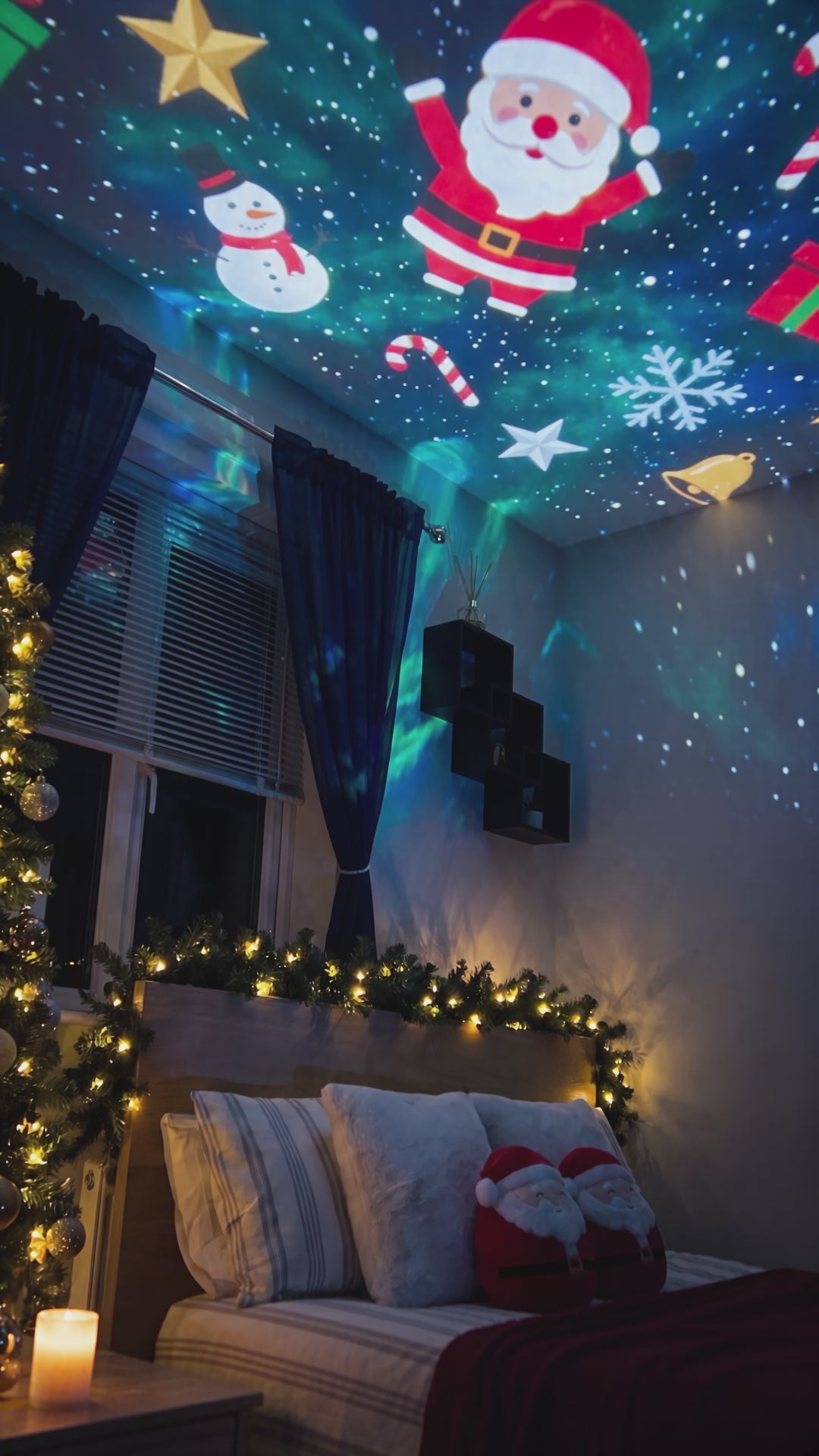 Christmas projector casting festive patterns across a bedroom ceiling